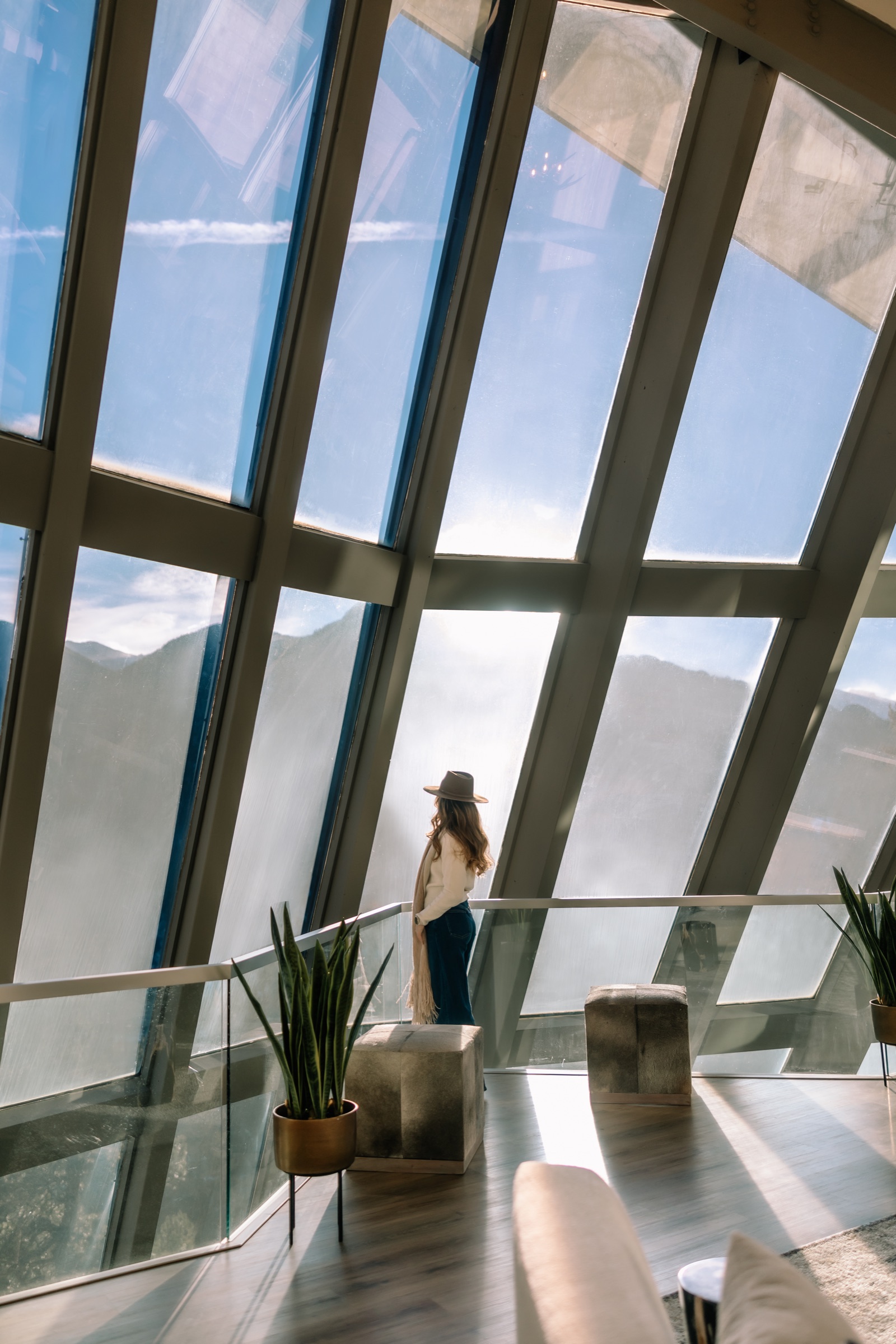 Inside the glass curtain wall, looking out toward the Continental Divide