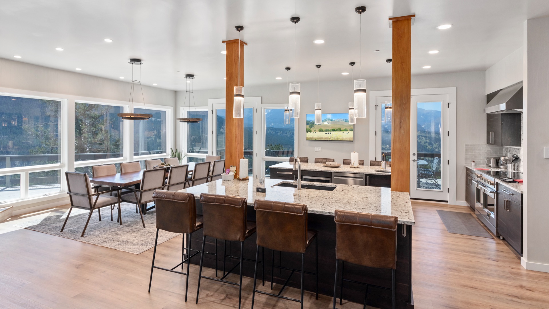 Kitchen area with modern appliances and mountain views