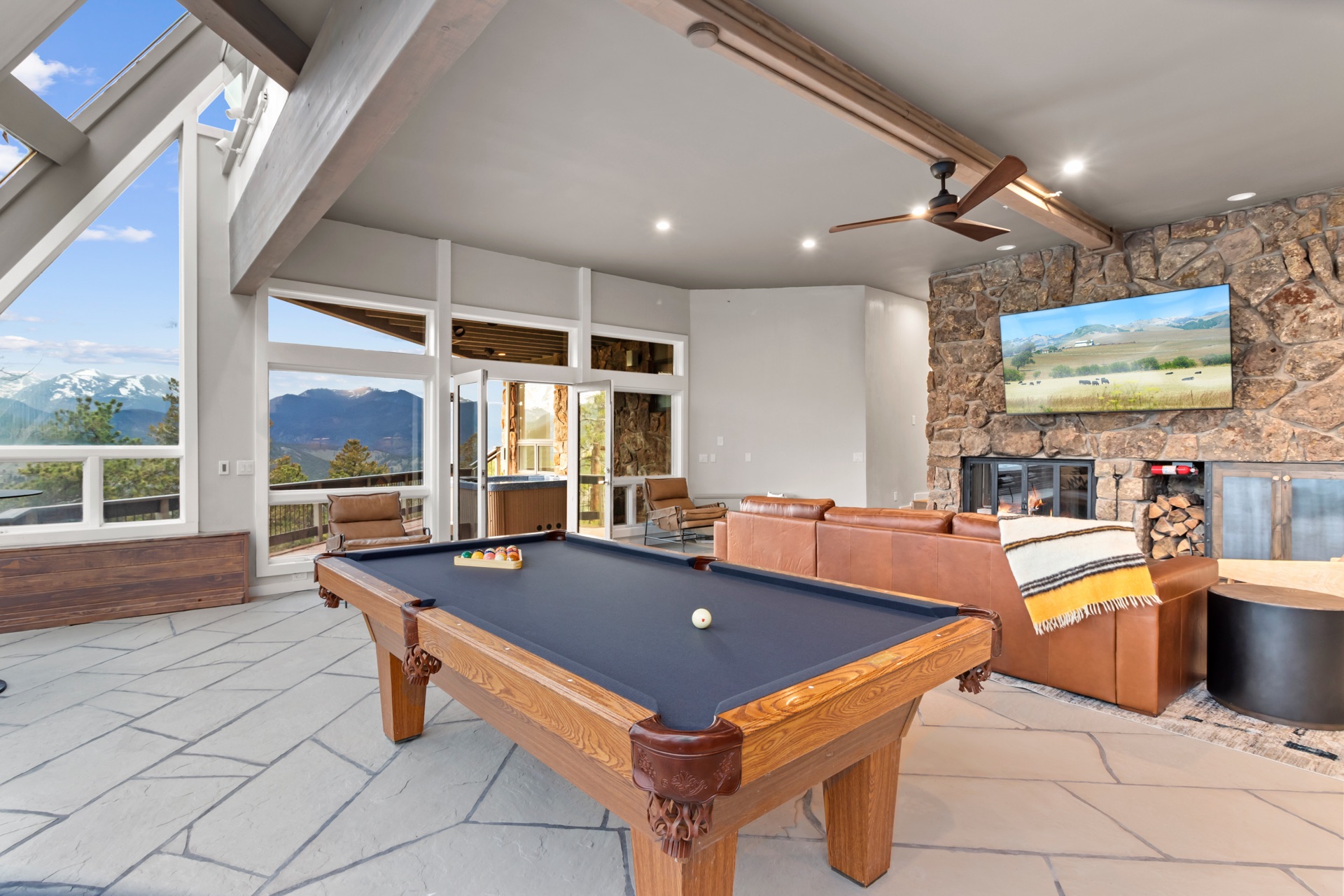 Descend to a cozy living space where comfort meets stunning vistas