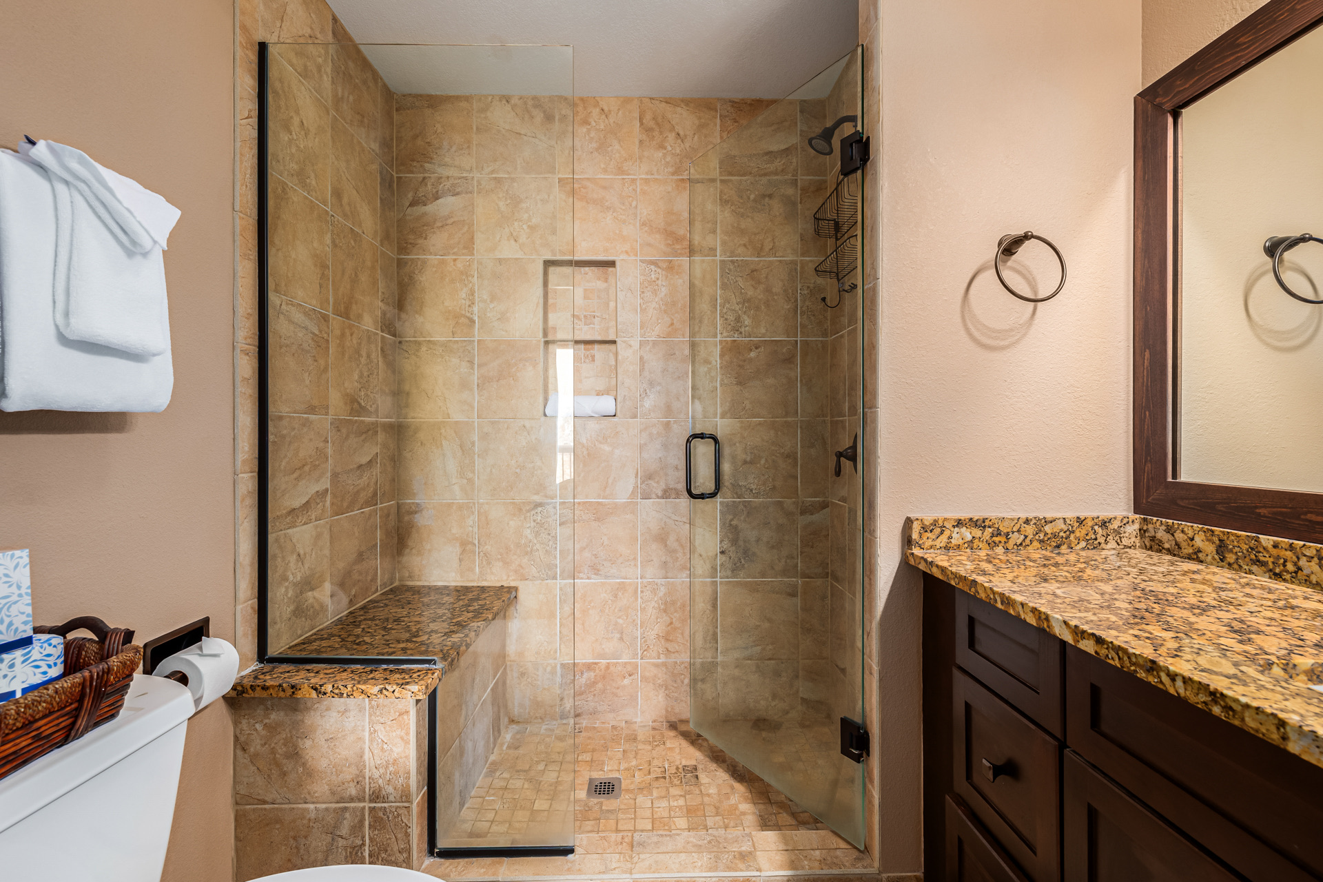 Renovated bathroom with tiled shower