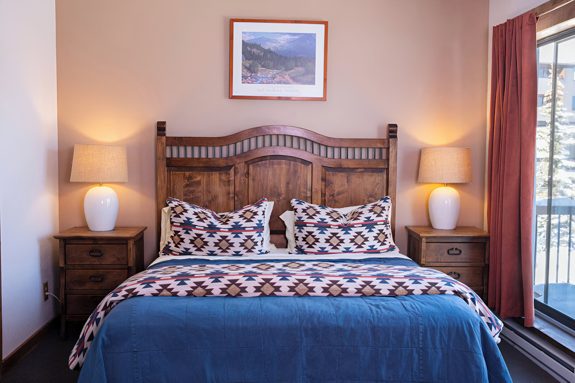 Master bedroom with king bed and mountain decor