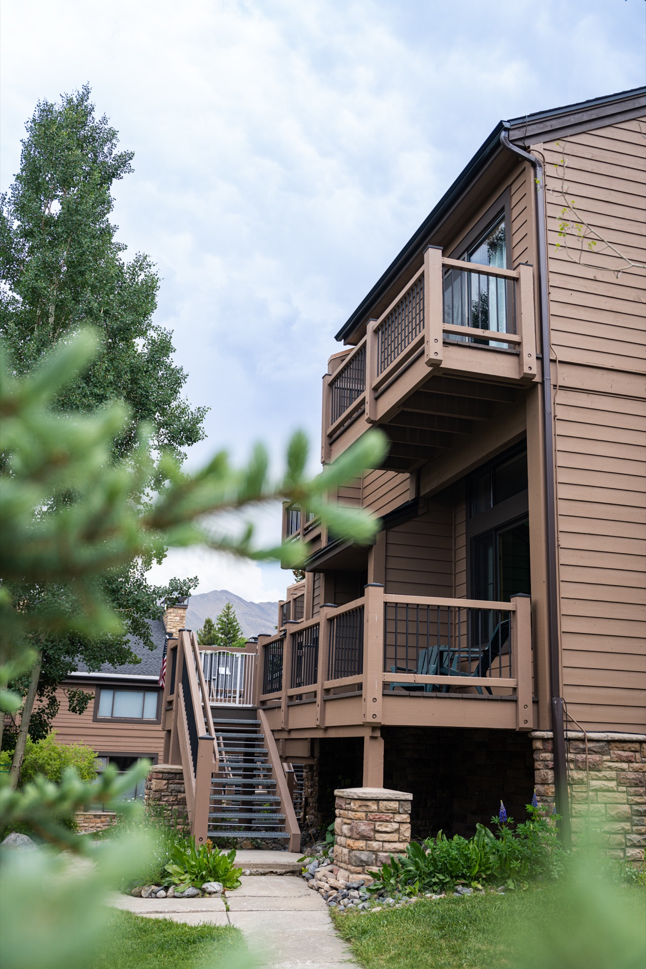 Cedars building exterior with deck levels and staircase
