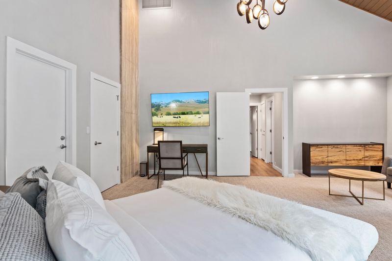Upstairs suite with queen bed and designer bedding